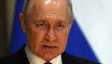 путін