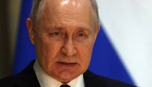 путін