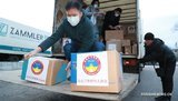 Защитные комбинезоны, обувь и маски: китайская диаспора в Украине отправила в Ухань гуманитарную помощь. ФОТОрепортаж