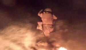 Surviving occupiers jump from boat into water after being hit by drone. VIDEO