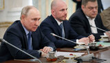 путін