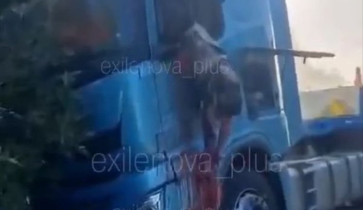 Body of driver from Voronezh hangs from truck cab after drone attack on road through occupied territories: "Driver’s goner. Yeah, he’s f#cked". VIDEO 18+