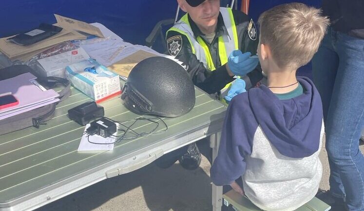 8-year-old son of missing employee of Kharkiv "Epicentr" submits DNA samples for examination. PHOTO
