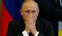 путін