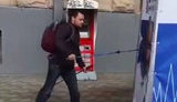 Мужчина под песню из "Титаника" сокрушил агитационную палатку Добкина в Харькове. ВИДЕО