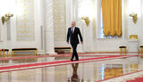 путін