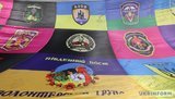 Волонтери та учасники АТО розгорнули "Прапор єдності армії та народу" в центрі Харкова. ФОТОрепортаж