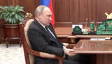 путін