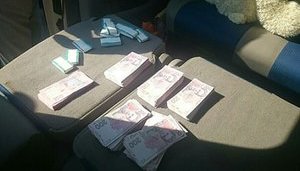 Співробітники обленерго попалися на хабарі 250 тисяч гривень у Запоріжжі. ФОТОрепортаж