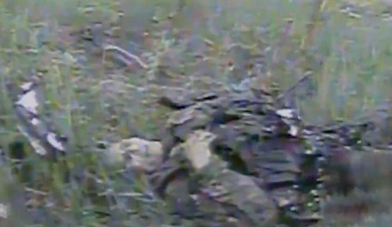 Operators from the 414th Brigade eliminated an occupier who was attempting to hide from a drone in tall grass.