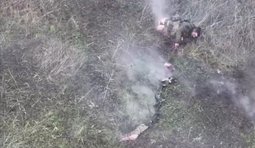 росіянин і відірвані ноги на полі бою