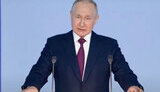 путін