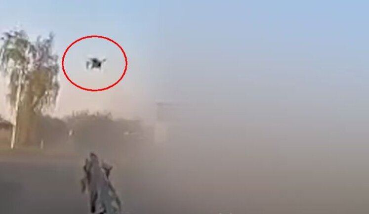Soldier with shotgun destroys Russian kamikaze drone that flew close to pickup truck. VIDEO