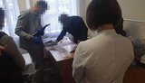 Поліція викрила працівників медкомісії на Вінниччині, які вимагали гроші за встановлення групи інвалідності. ФОТОрепортаж