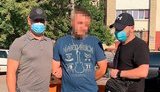 Члени банди здирників, яка вимагала неіснуючі борги, затримані в Києві, - СБУ. ФОТОрепортаж