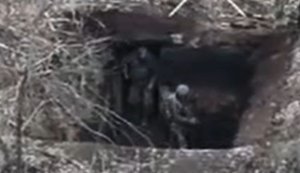 Russians drive their comrade out of dugout under attack from Ukrainian drone. VIDEO