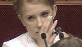 Тимошенко объяснила, что она не мазохистка - просто пальцы часто зажимают дверями. ВИДЕО. (обновлено)