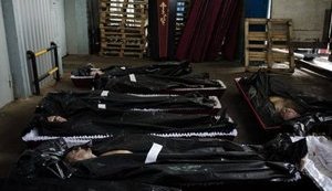 40 наемников Путина вернулись в Россию в одном рефрижераторе. ФОТОрепортаж