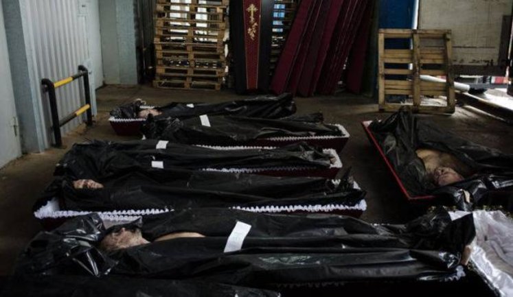 40 наемников Путина вернулись в Россию в одном рефрижераторе. ФОТОрепортаж