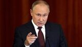 путін