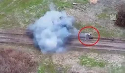 The Russian’s body flies down the road