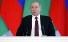 путін