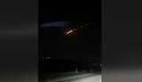 росія