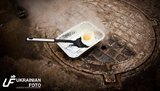 Обогрев воздуха по-украински: на люке теплотрассы приготовили яичницу за 10 минут. ФОТО