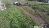 Швидкісний потяг під Києвом збив жінку на скутері. ФОТО