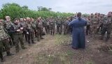 священник