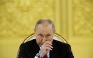 путін