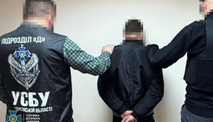 Traitor who worked for enemy at "district department of Russian Ministry of Internal Affairs" during occupation of Kherson and kept records of abducted people exposed – SSU. PHOTO