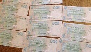 У Дніпрі оперативники затримали подружжя фальшивомонетників, які друкували 500 гривневі "купюри". ФОТОрепортаж