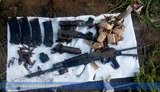 Схованку із "втраченою в боях" зброєю знайшли в покинутій школі в зоні ООС. ФОТО