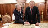 путін