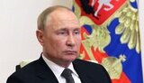 путін