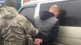 Пенсіонер МВС напав на поліцейських із пістолетом, намагаючись звільнити затриманого в Київській області, - Нацполіція. ФОТО