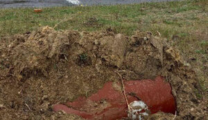 Russians in Nova Kakhovka bury barrels with unknown contents at intersections, - Khlan. PHOTO