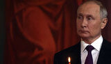 путін