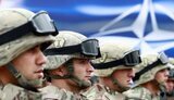 Байден пообещал при необходимости перебросить дополнительные войска в страны НАТО, - президент Эстонии Карис