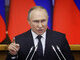 путін