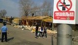 "Когда терпению приходит конец": киевляне громили "гэндэлыки" в столичном парке. ФОТОрепортаж