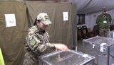 Військові активно голосують на спецдільницях у зоні ООС, вибори тривають у штатному режимі, - штаб. ВIДЕО