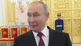путін