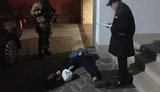 Патрульний у Києві вимагав 150 тисяч доларів, його затримало ДБР. ФОТОрепортаж