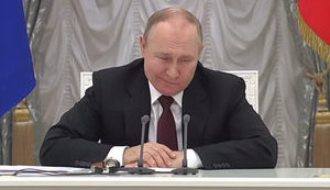 путін