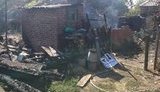 Противник обстрелял Новгородское из крупнокалиберного пулемета и стрелкового оружия, сгорела хозяйственная постройка, - пресс-центр ОС. ФОТОрепортаж