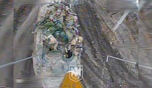 Kamikaze drone flies into Russian stormtroopers riding on armour. VIDEO