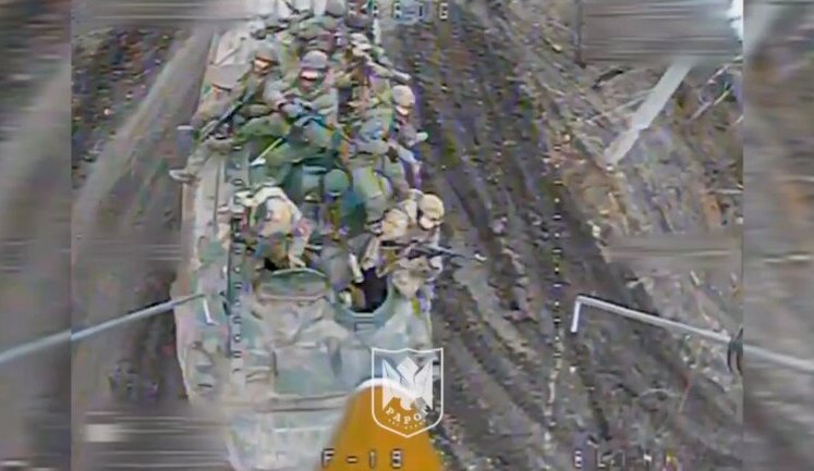 Kamikaze drone flies into Russian stormtroopers riding on armour. VIDEO
