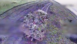 дрон атакує окупантів на вантажівці